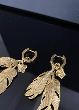 Брендові сережки