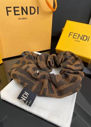 Брендова гумка для волосся