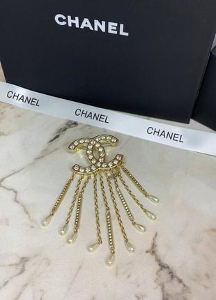 Брендовий брошка з підвісними елементами з цирконієм в позолоті. люкс якість