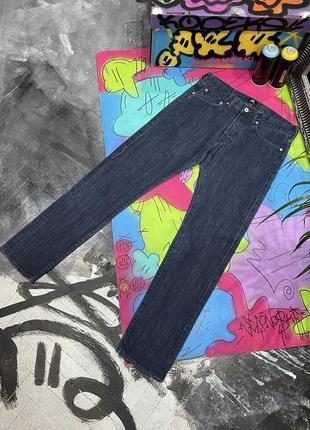 Завужені щільні джинси з фабричними потертостями edwin slim tapered