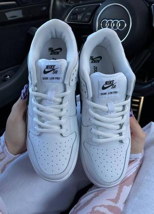 Жіночі кросівки nike sb dunk low retro all white black5 фото