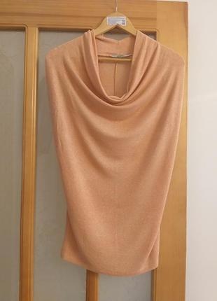 Красива персикова кофточка з ниткою люрексу.