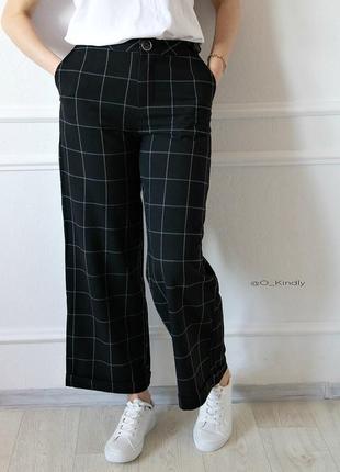 Брюки клеш в клетку mango