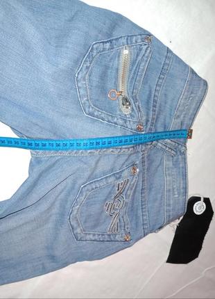 Светло голубого цвета новые женские джинсы на бёдрах качественные6 фото