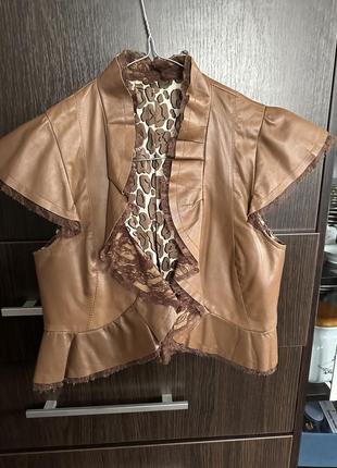 Шкіряна жилетка