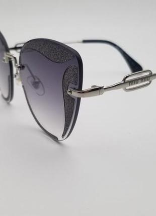 Солнцезащитные очки в стиле miu miu2 фото