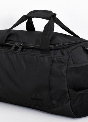 Спортивная современная вместительная сумка черного цвета легкая из прочной ткани  00197874 фото