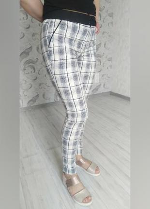 Брюки в клетку