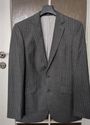 Шерстяной классический пиджак от известного бренда.1 фото