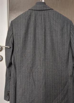 Шерстяной классический пиджак от известного бренда.3 фото