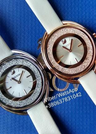Женские часы swarovski с белым ремешком (роз.золото)3 фото