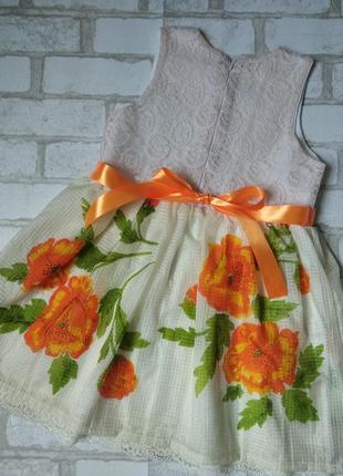 Нарядное платье на девочку с цветами6 фото
