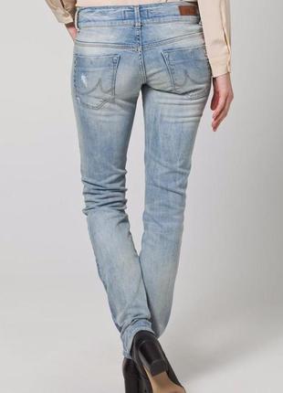 Голубые рваные зауженные джинсы ltb8 фото