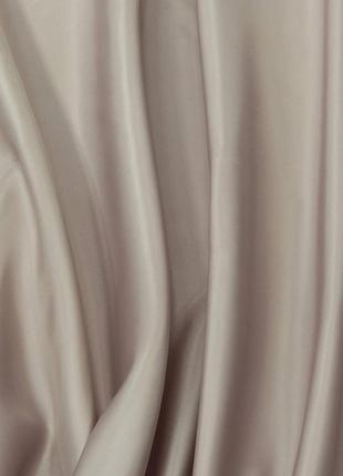 Ткань атлас подкладочная бежево-розовая для одежды1 фото