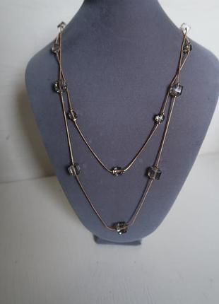 Прикраса довга на шию з чорно-темно-сірим прозорим камінням