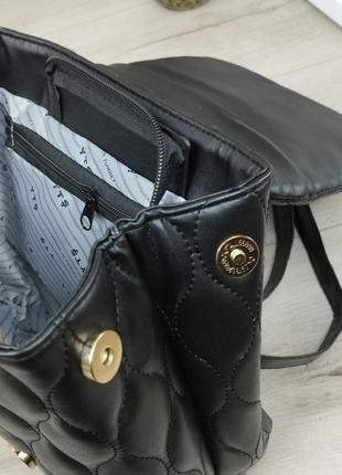 Сумка-рюкзак черного цвета8 фото