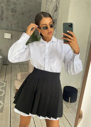 Тенісна спідниця в складку