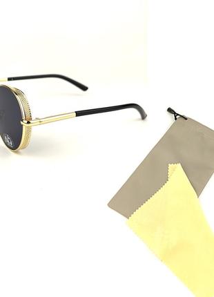 Сонцезахисні окуляри flyby «palm» в золотій металевій оправі з чорною лінзою4 фото