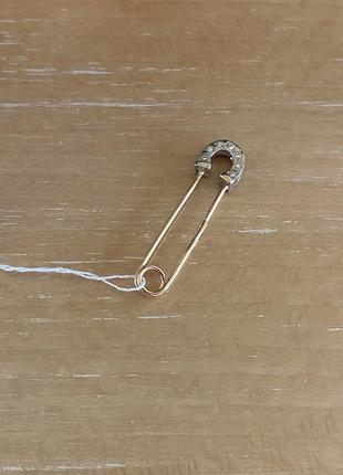 Золотая булавка подкова