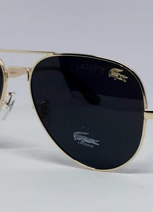 Lacoste очки капли мужские солнцезащитные черные поляризированые в золотом металле на флексах
