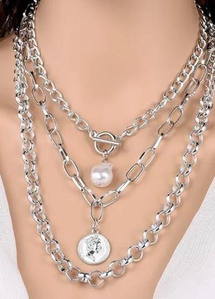 Многослойное ожерелье- цепочка с подвесками  в серебряном цвете.1 фото
