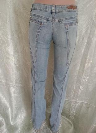 Нові жіночі джинси завужені до низу злегка кльош