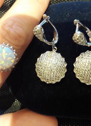 Серебряные серьги снежинки фианиты золотая королева1 фото