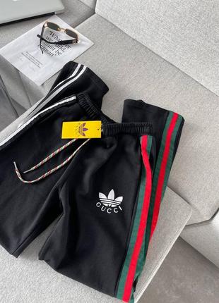 Брюки в стиле gucci adidas спортивные клэш палаццо черные высокие3 фото