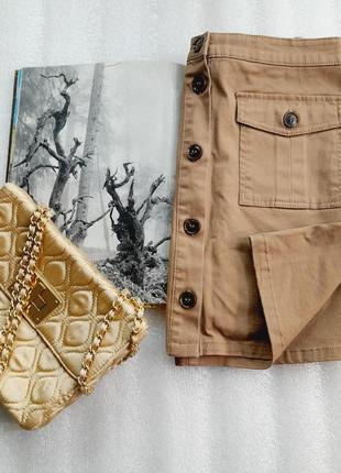 Стильная мини.пуговицы расчигиваются