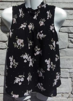 Красивая, стильная блуза черного цвета в цветочный принт2 фото