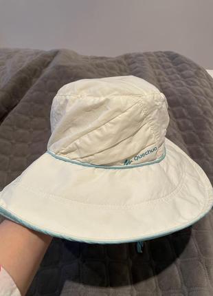 Белая шляпа quechua p.52