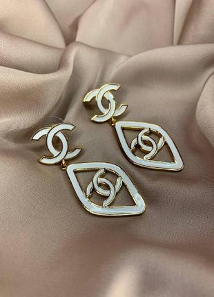 Брендові сережки гвоздик із логотипом позолота цирконій ромб4 фото