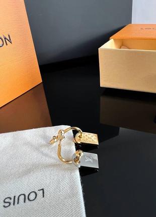 Сережки луї віттон