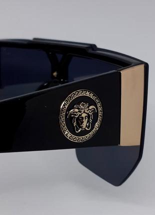 Очки в стиле versace женские солнцезащитные маска черные с золотым логотипом6 фото