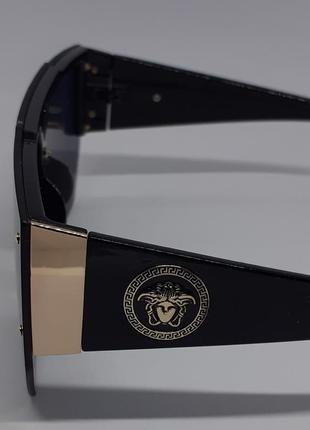 Очки в стиле versace женские солнцезащитные маска черные с золотым логотипом4 фото