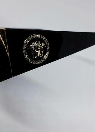 Очки в стиле versace женские солнцезащитные маска черные с золотым логотипом7 фото