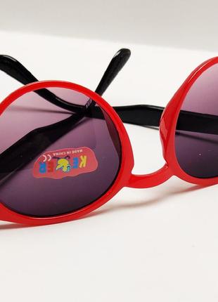 Окуляри дитячі сонцезахисні червона оправа чорні дужки5 фото
