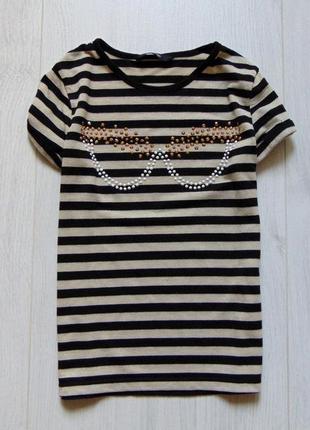 Яркая футболка для девочки.
george.
размер 8-9 лет