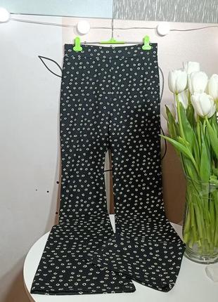 Штани кльош у квітковий принт