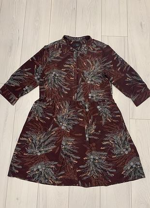 Свободное платье миди с кармашками