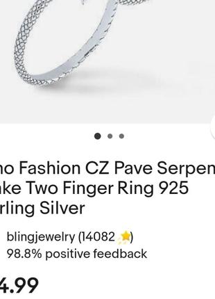 Серебряное двойное кольцо змея с полями стразами10 фото