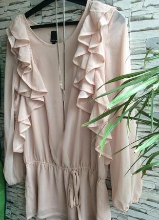 Эффектная блуза с рюшами