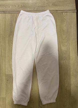 Білі спортивні штани