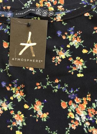 Дуже красива та стильна брендова блузка-маєчка у квіточках.