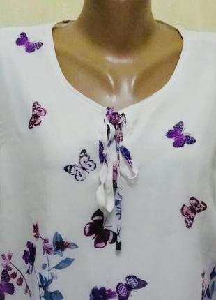Блузка в метеликах