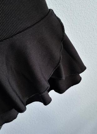 Трикотажная юбка с воланом4 фото