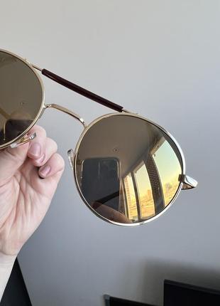 Круглые солнцезащитные очки с боковой шерохой9 фото