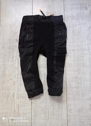 Черные штанишки на маленьком моднике в идеальном состоянии бренда river island