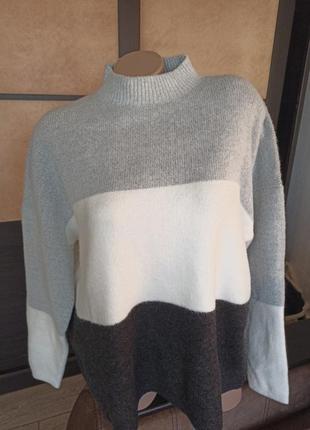 Шикарний светр l,xl2 фото