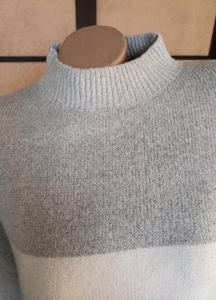 Шикарний светр l,xl3 фото
